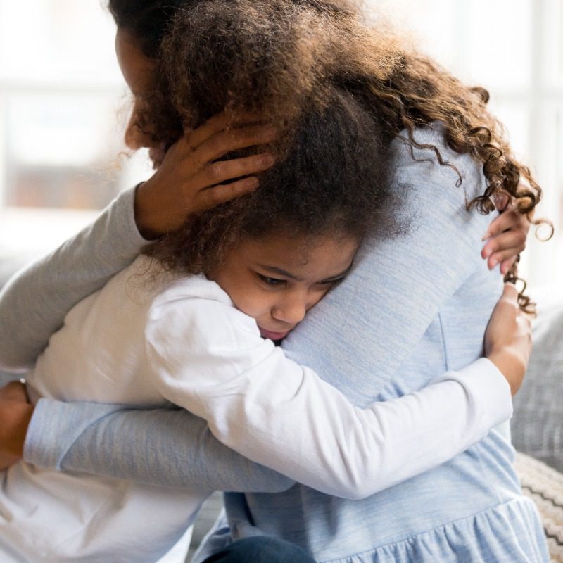 American loving mother supports disappointed daughter sympathizing, making peace after scolding concept